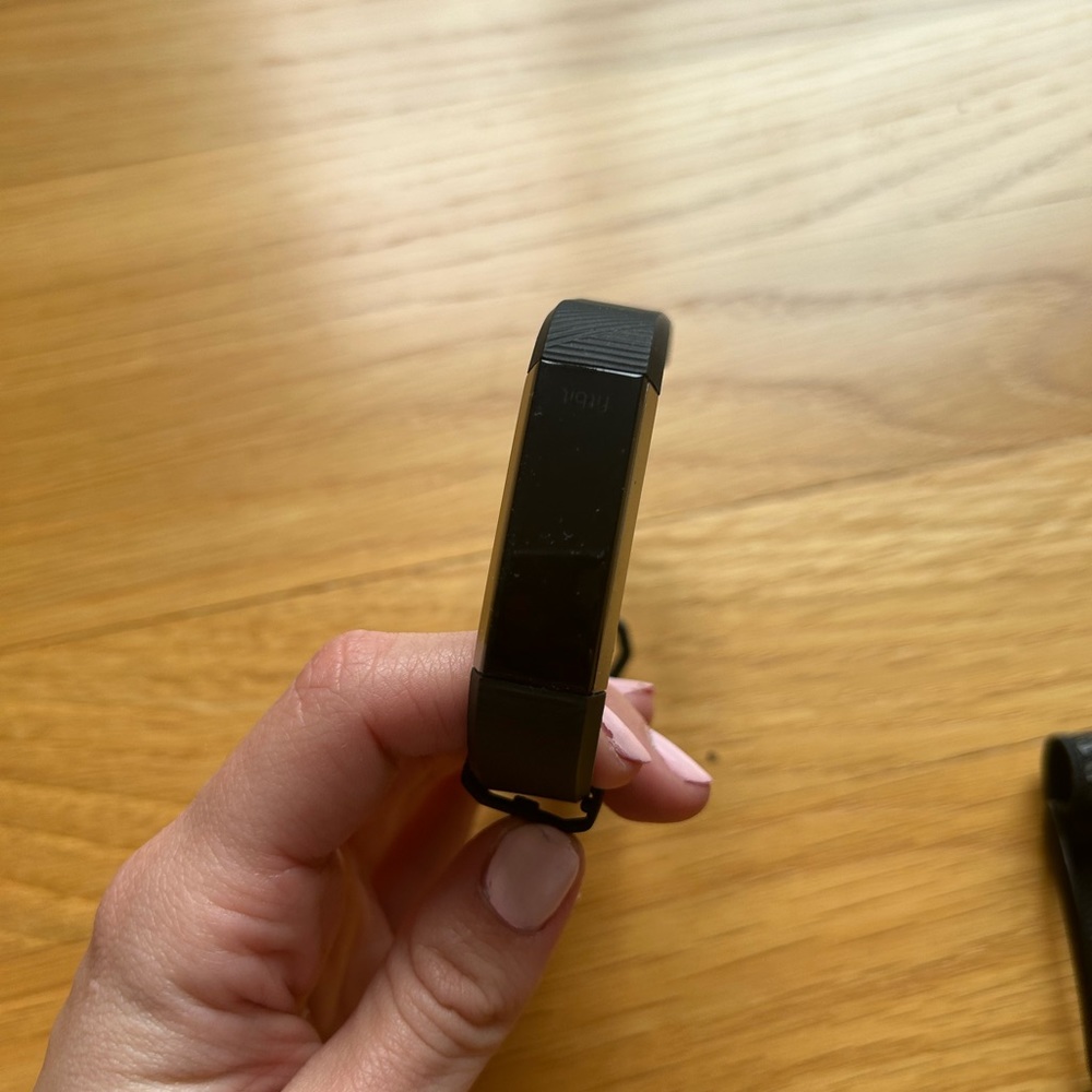 Fitbit black wrist band smart watch for step counting and more